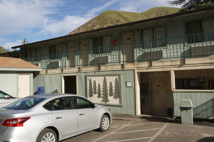 a car parked in front of a house