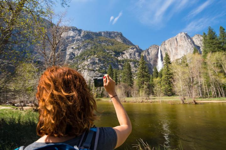 a person standing in front of a lake
