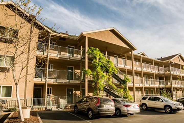 a car parked in front of a building