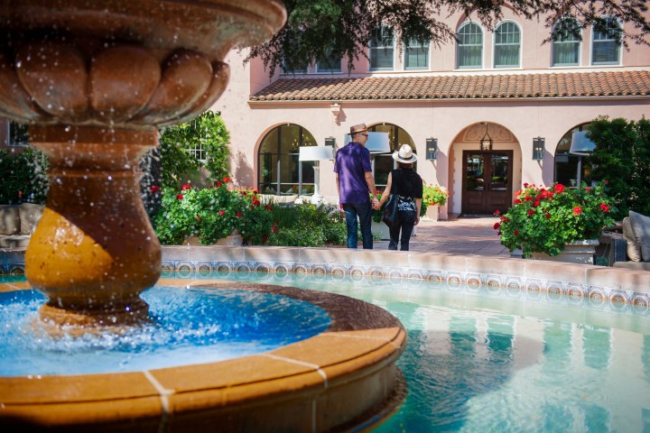 a fountain in front of a building