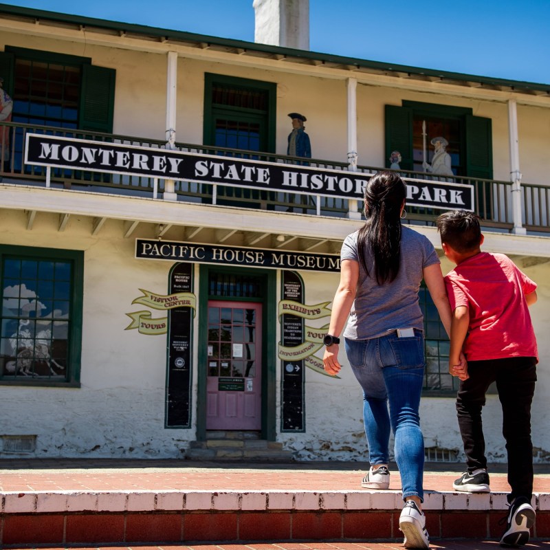 a man standing in front of a building