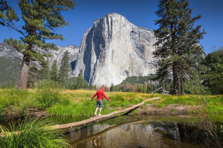 a man walking up a hill